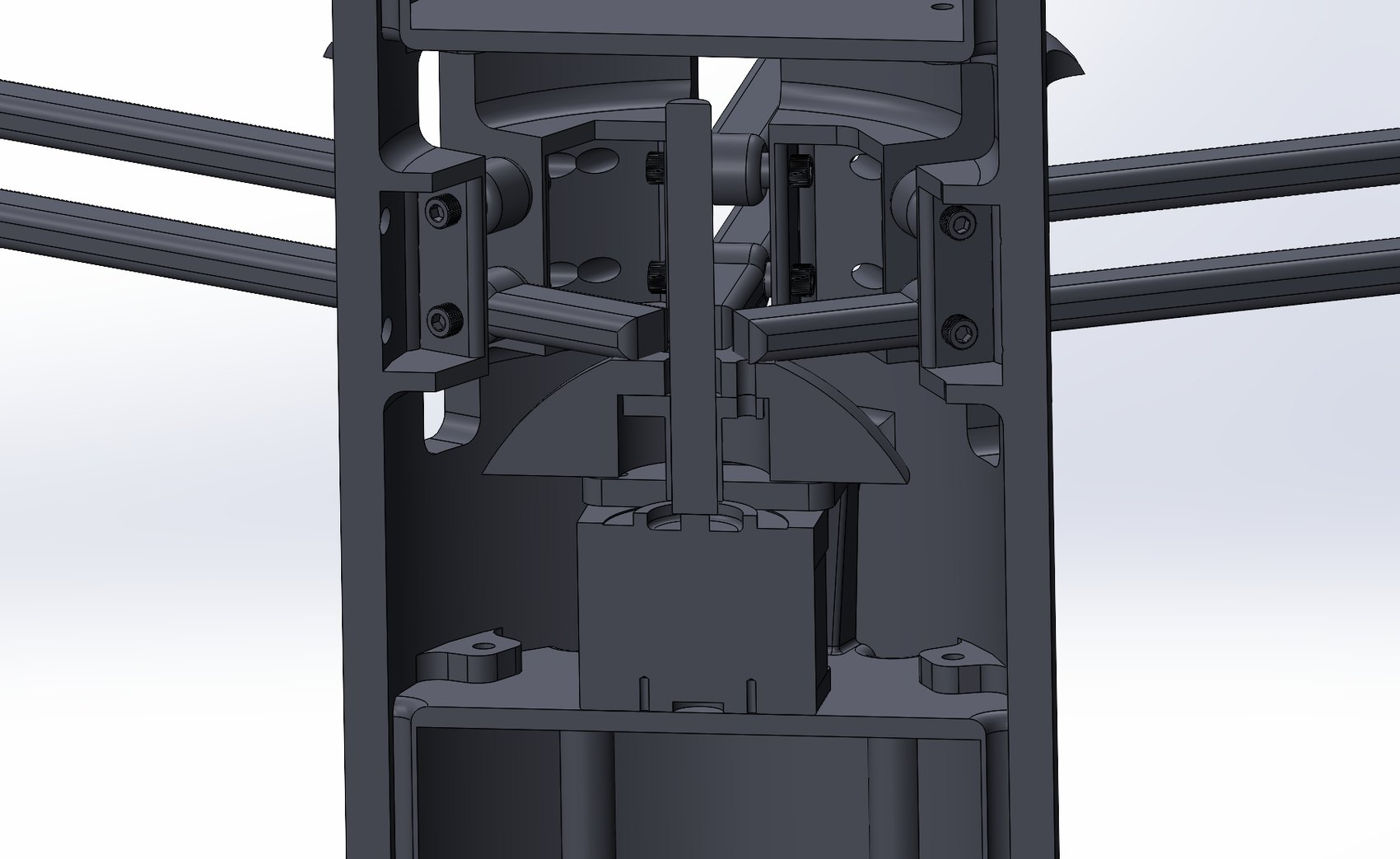 Section through the flood bay: lead screw, nut, and the arc-profiled plunger that drives all six arm linkages.